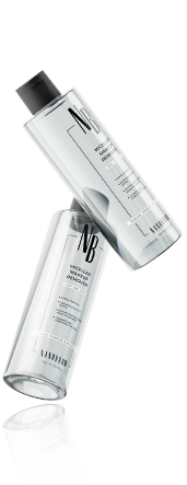 Dve priehľadné fľaštičky odličovača